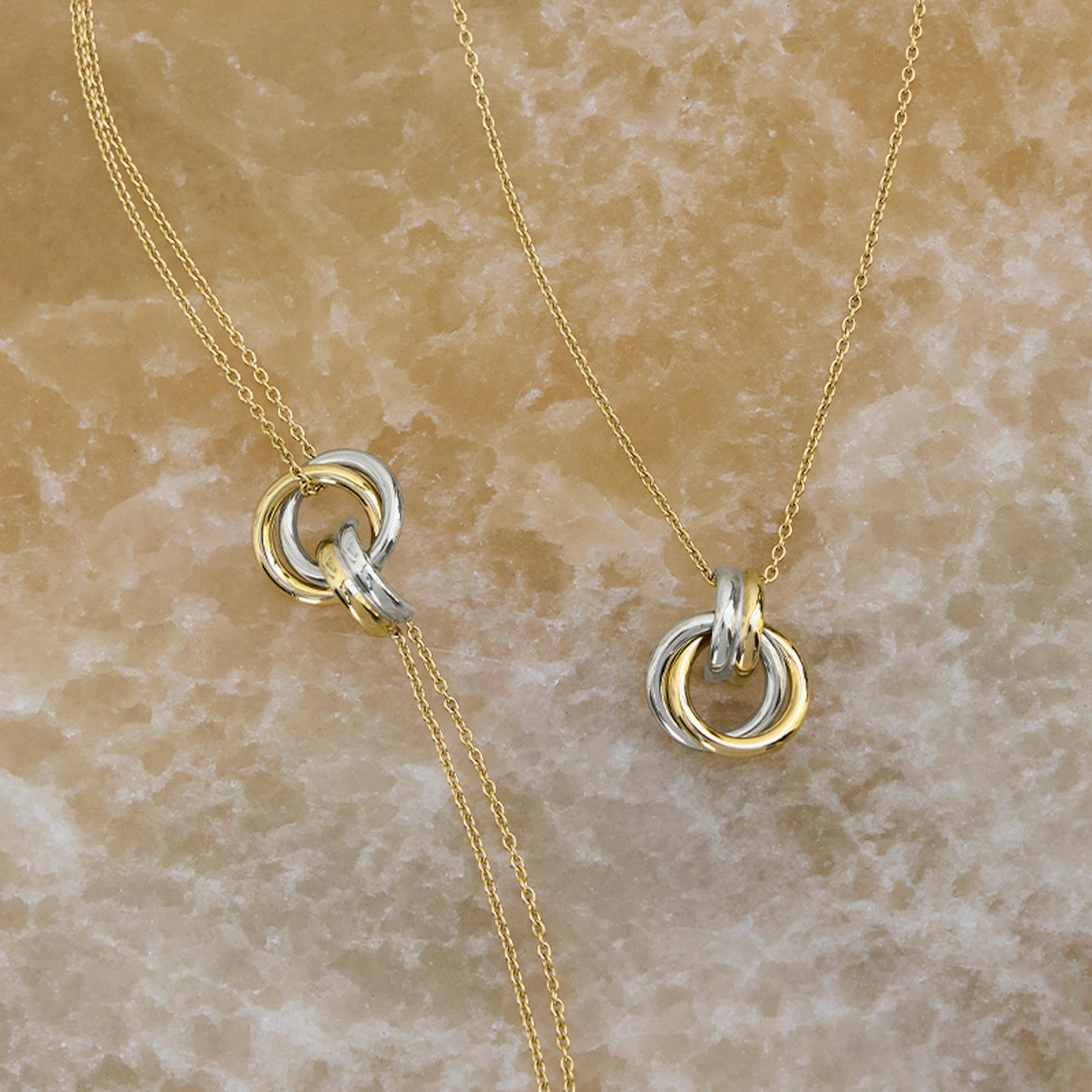 Armband und Halskette in Gold und Silber mit Ring Motiv